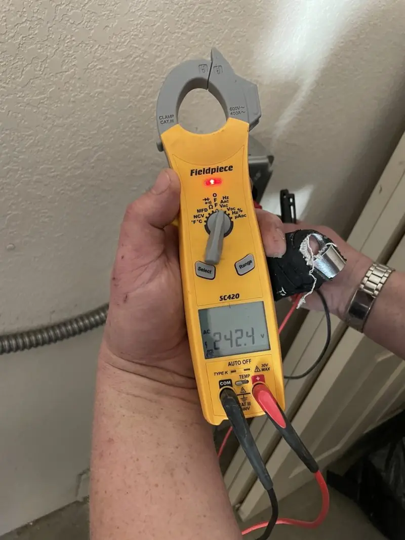 Voltage testing with clamp meter during Generator Installation in Coachella